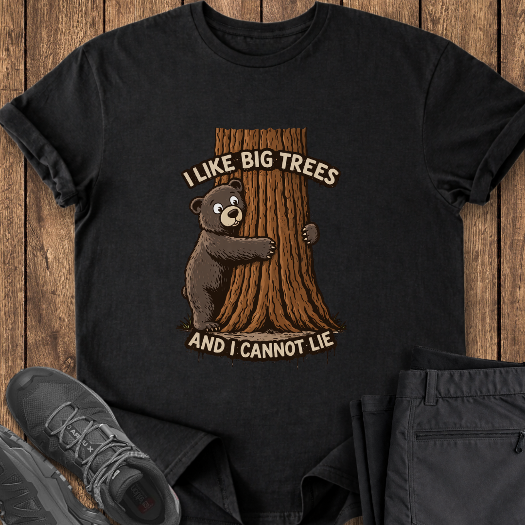 Black t-shirt with bear and tree design on a wooden surface funny tree hugger shirt