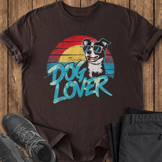 Brown t-shirt with dog graphic and 'Dog Lover' text on a wooden surface
