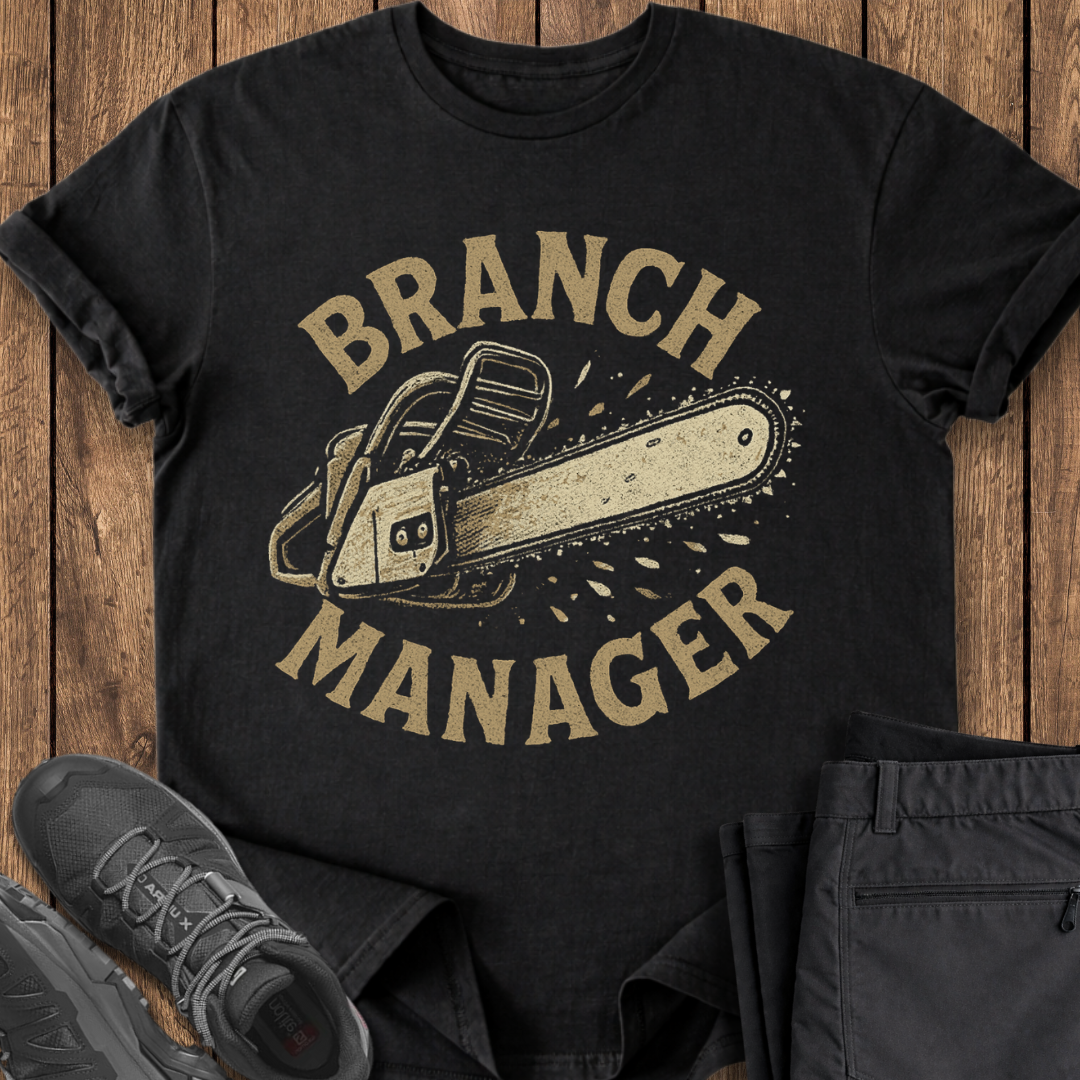 Black t-shirt with 'Branch Manager' graphic on a wooden surface with shoes and pants. funny camping t shirt 