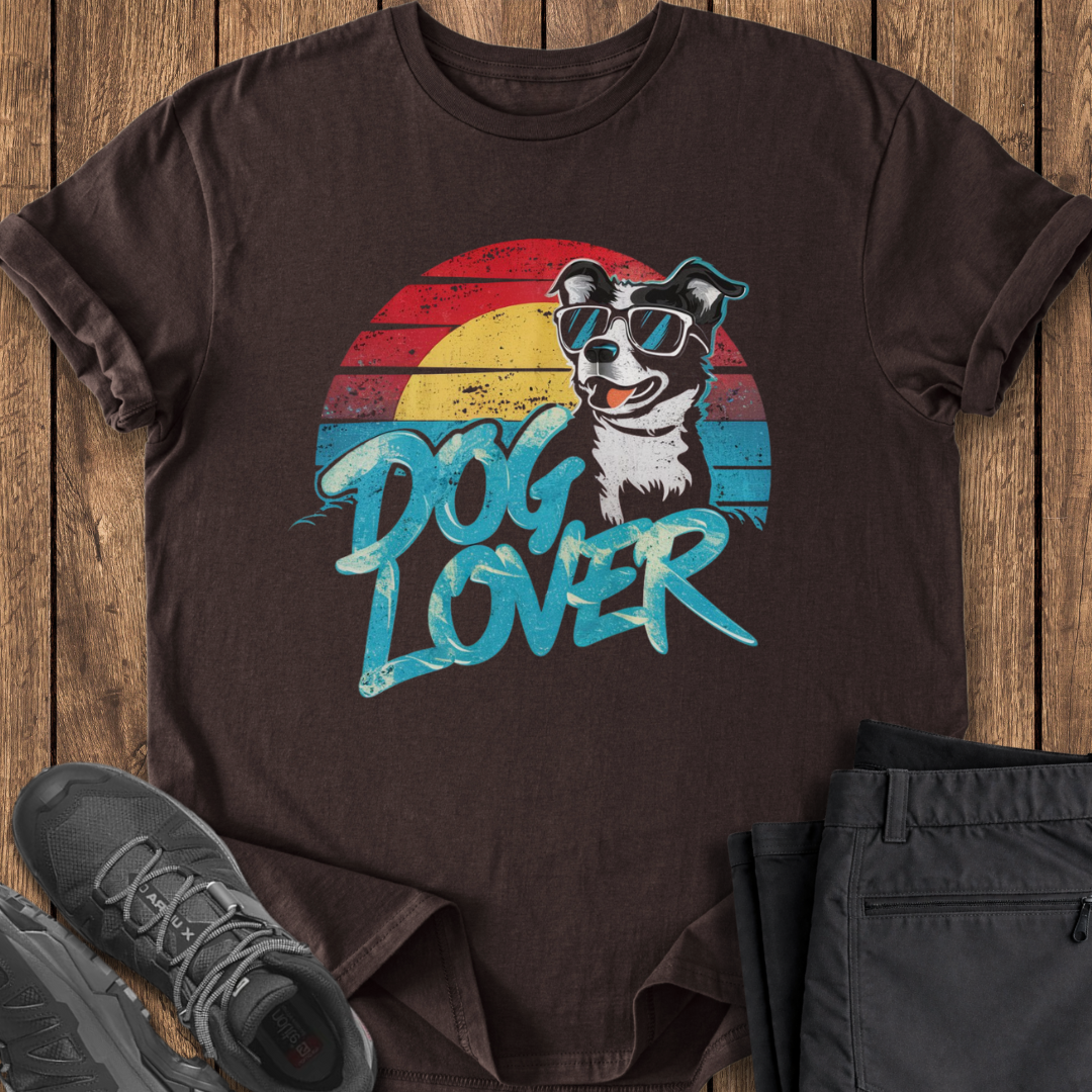 Brown t-shirt with dog graphic and 'Dog Lover' text on a wooden surface