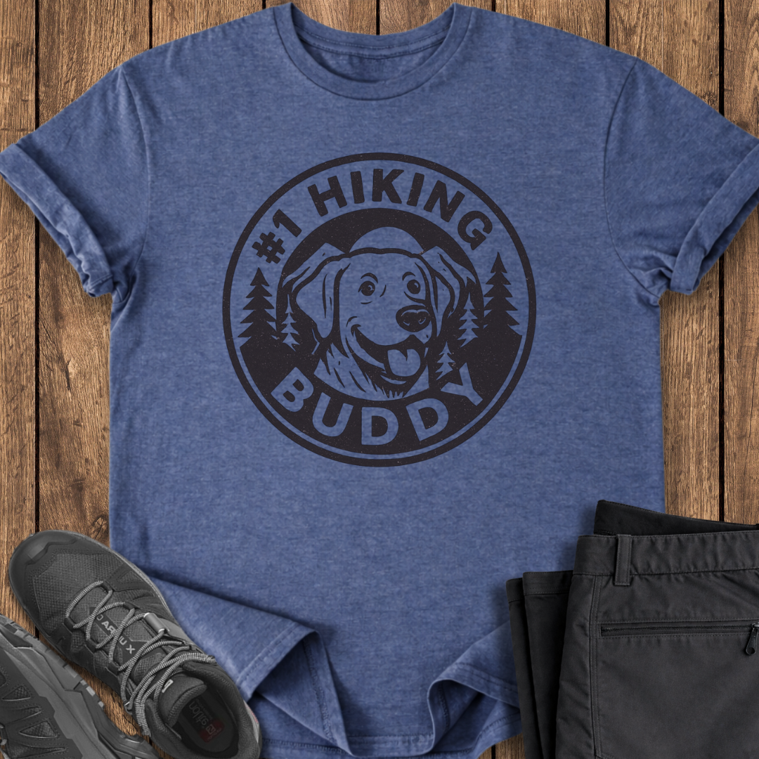 Blue t-shirt with '#1 Hiking Buddy' graphic on a wooden surface with shoes and pants. labrador dog lover hiking t shirt