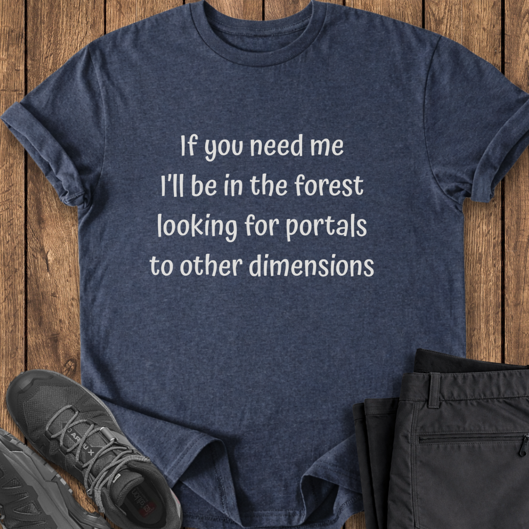 Navy blue t-shirt with humorous text on a wooden surface with shoes and pants. funny hiking camping t shirt