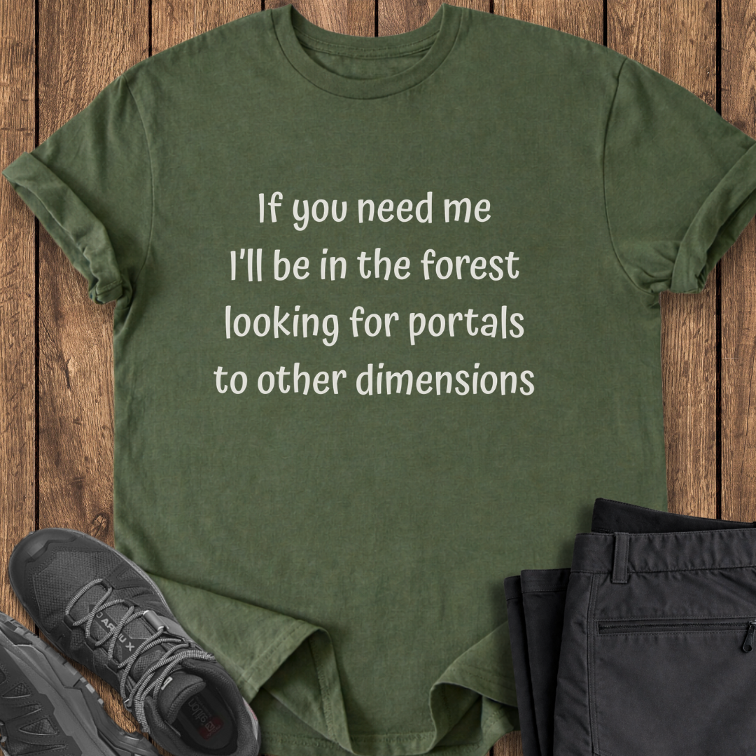 Green t-shirt with humorous text on a wooden surface with shoes and pants. funny adventure explorer hiking t shirt