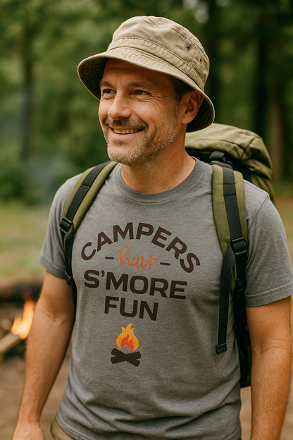 Man wearing a gray t-shirt with a camping slogan and a backpack, standing in a forest.